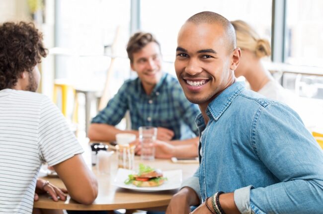 happy man in cafeteria