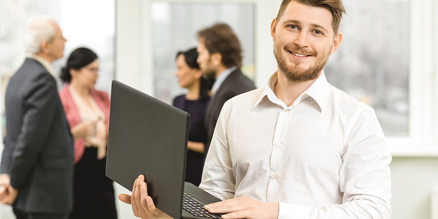 Handsome young businessman at his office
