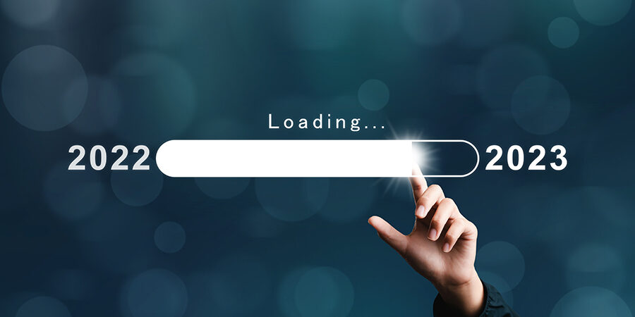 Businessman pointing bar numbers loading virtual new year 2023 t Businessman pointing bar numbers loading virtual new year 2023 to countdown from 2022 merry christmas arrangements. goal plan. goal concept. action plan, strategy, new year business vision