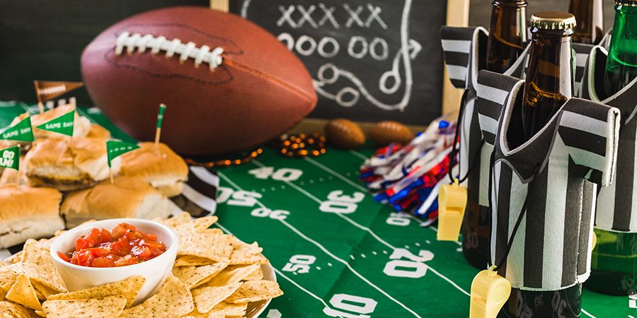 Football party Game day football party table with beer, chips and salsa.