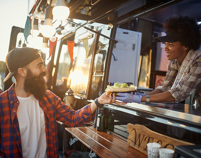 man-and-women-at-food-truck man and women at food truck