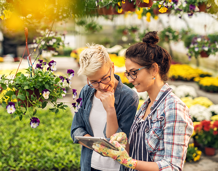 two women at a garden center